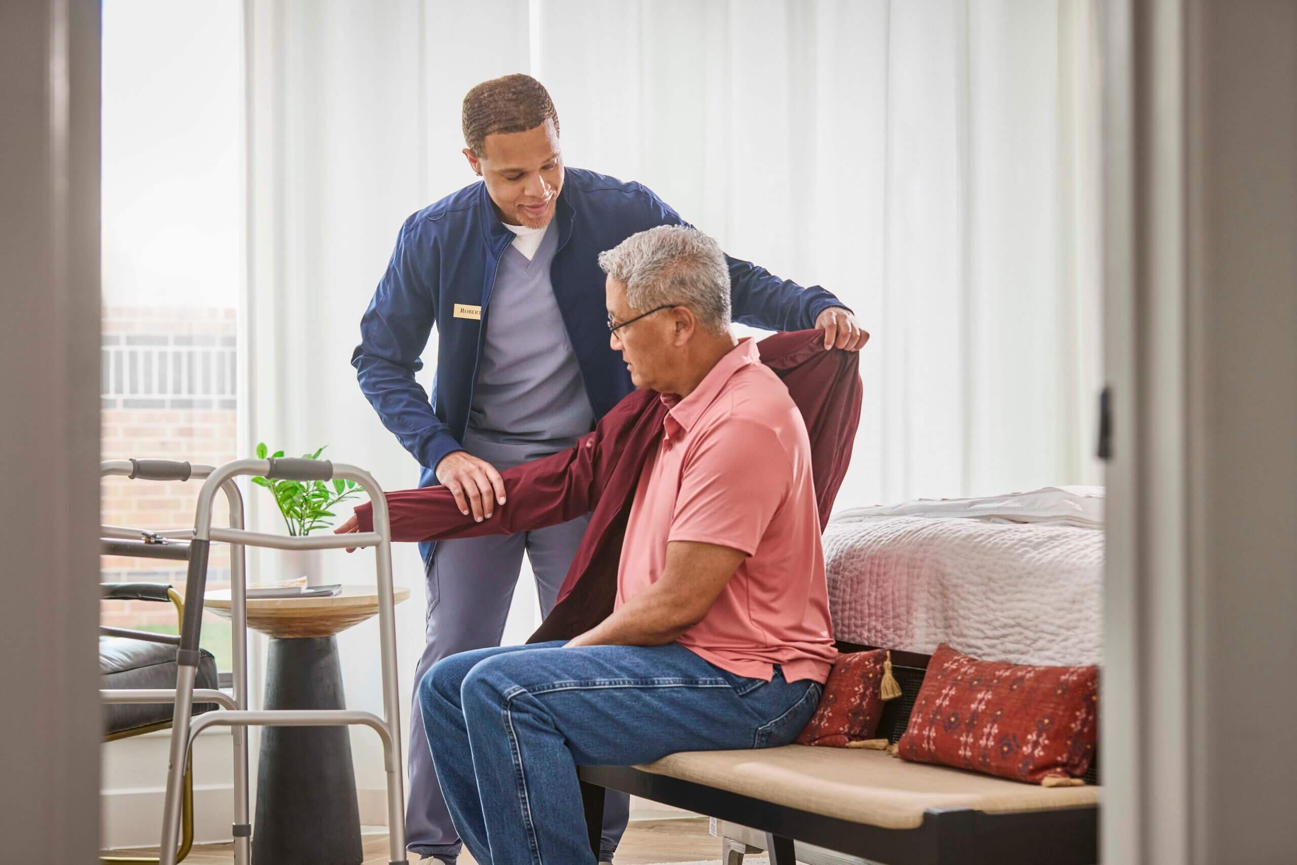 Caregiver supporting senior at home in Calgary